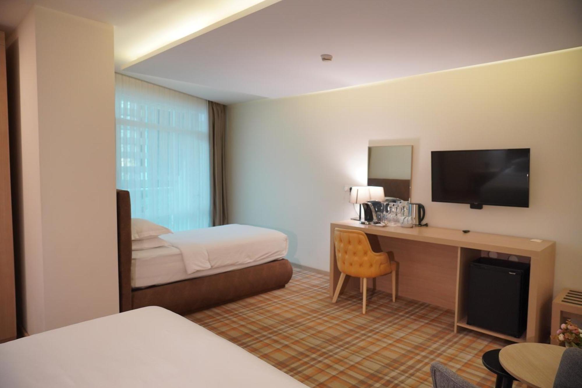 베스트웨스턴 프리미어 바투미 호텔 외부 사진 A room at the hotel